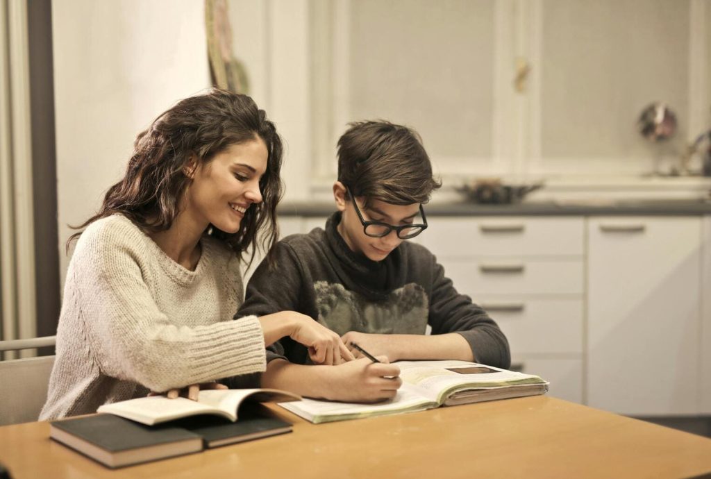 Teacher explaining a lesson to a student