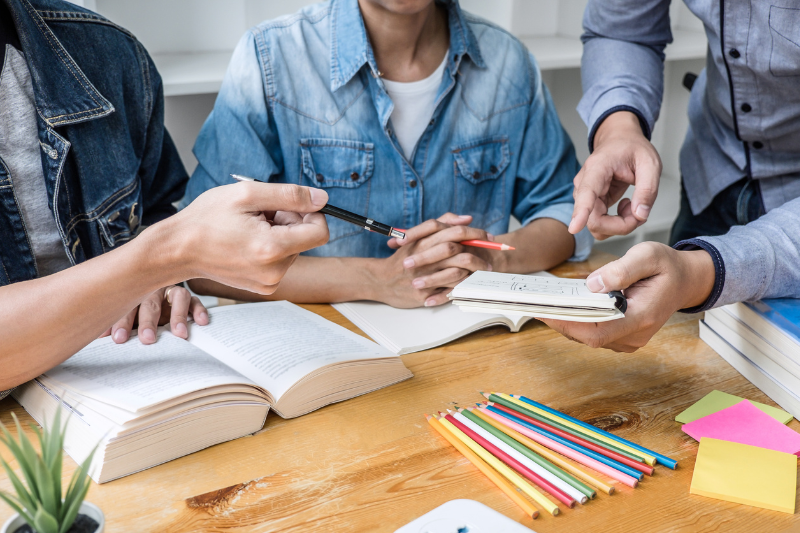 Desk with students learning